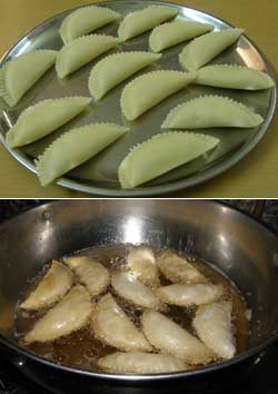 Premium Photo | Gujiya or gujia or karanji. sweet dumplings made during the  festival of holi and diwali, served in a plate